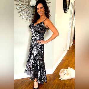 Nordstrom’s evening dress! Beautiful silky and flowy! Will fit size: 0, 1, 2